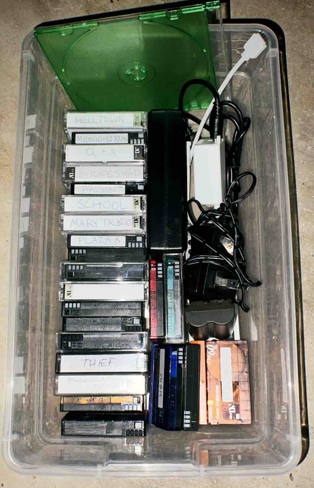 Collection of video tapes in storage container